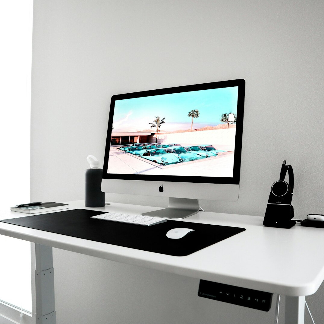 Laptop displaying a software dashboard on a clean desk